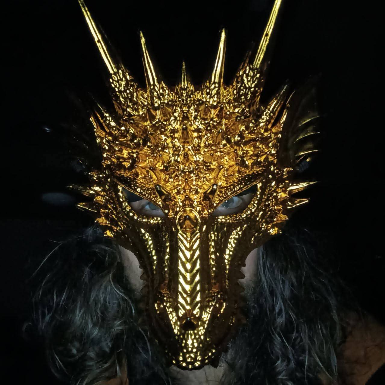 Dream wearing a gold dragon mask